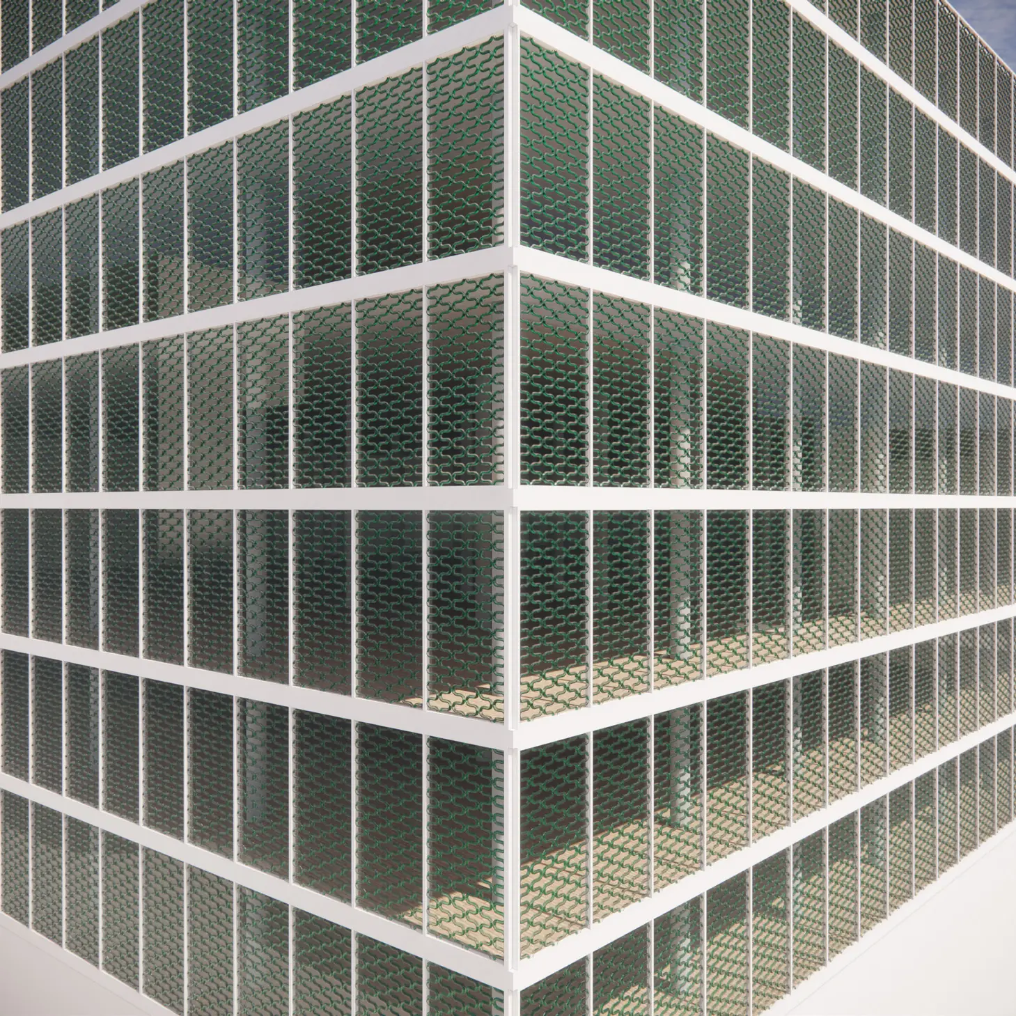 Exterior view: building corner with façade modules of glass tubes in front of the floor slabs